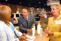 Marc Morial talking with sponsors